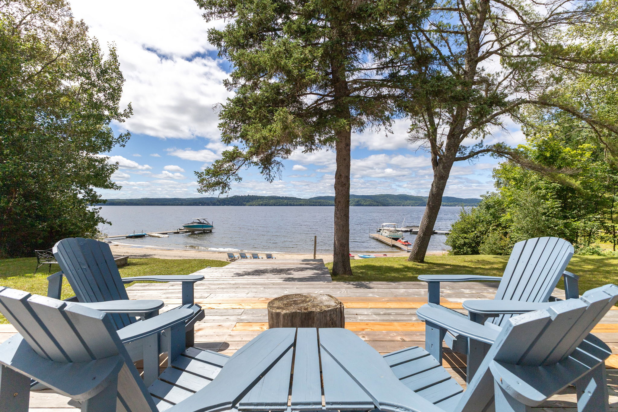 Luxury Lac-Simon waterfront cottage with private 150-foot sandy beach and panoramic lake views