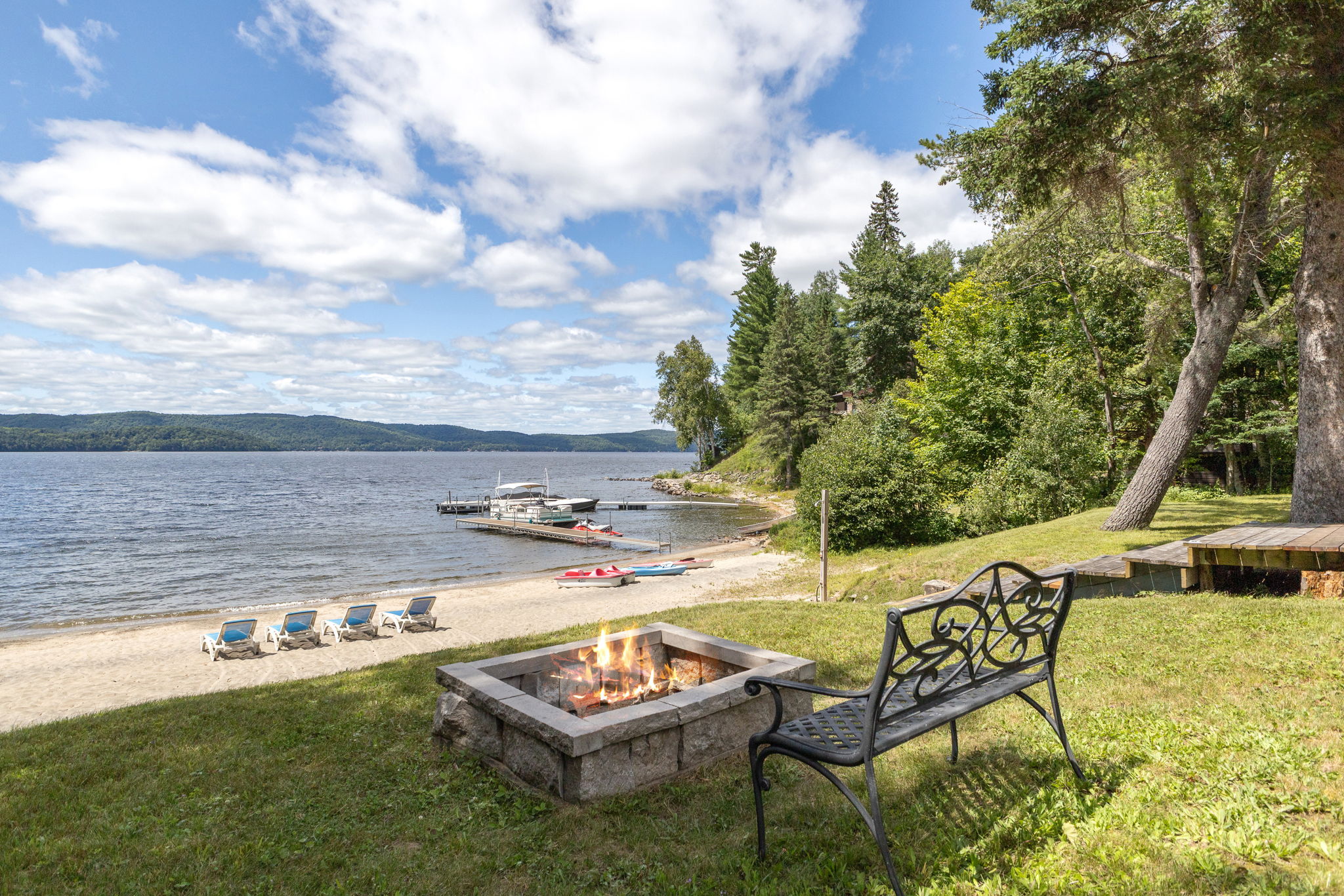 2000 square foot terrace overlooking Lac-Simon with sunset views and outdoor seating